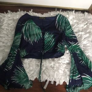 Long, flare sleeved tie up blouse